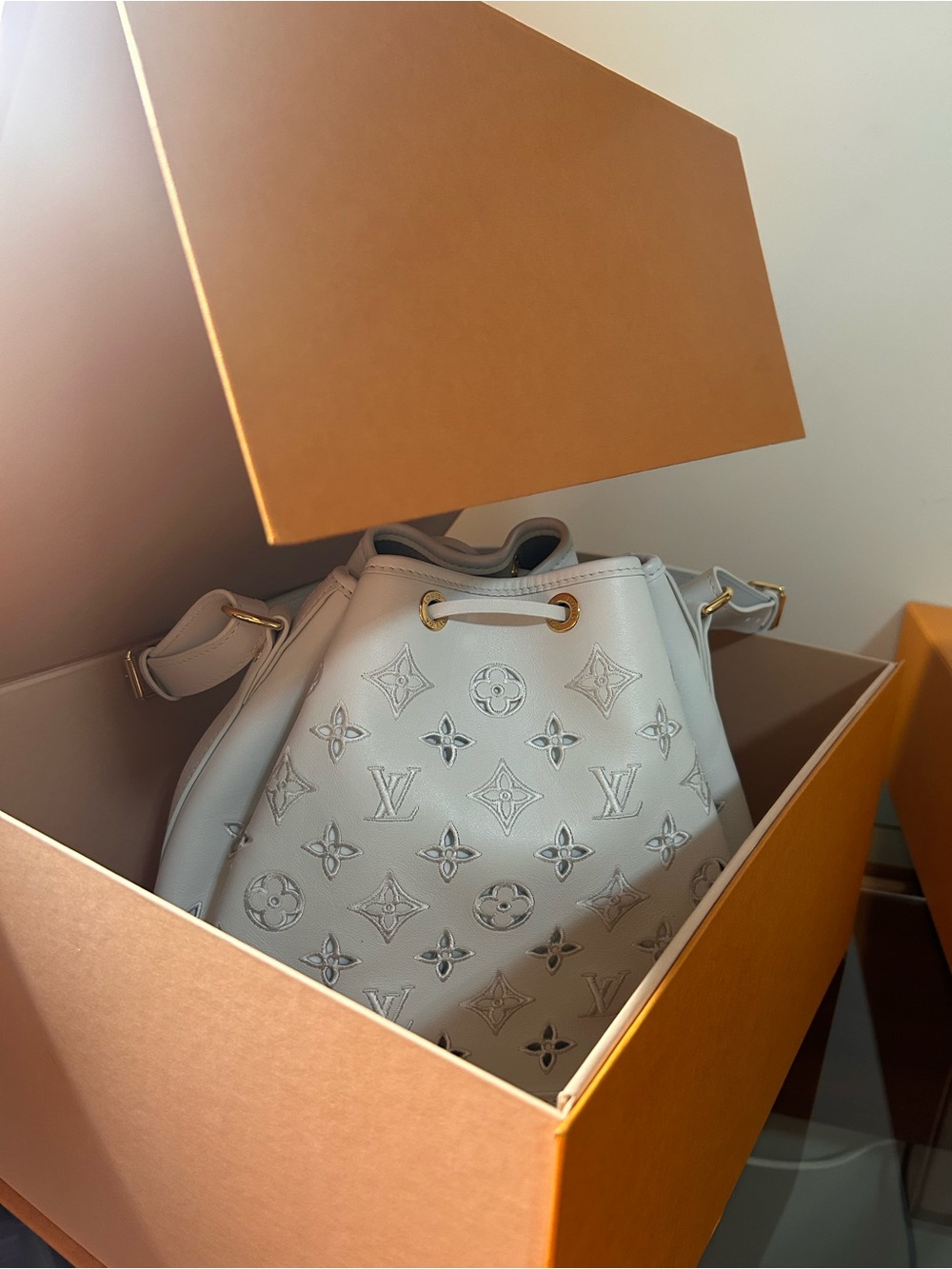 Authentic Louis Vuitton Cream Monogram Empreinte Drawstring Shoulder Bag